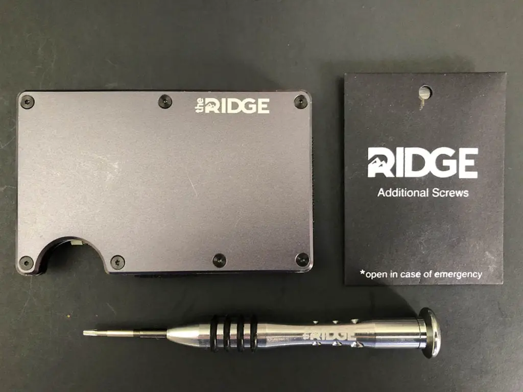 Ridge wallet with screws and screwdriver
