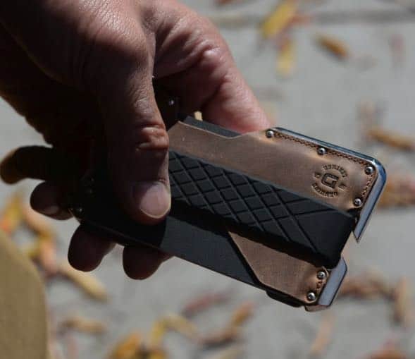 Dango D02 Dapper 2 wallet held by a hand