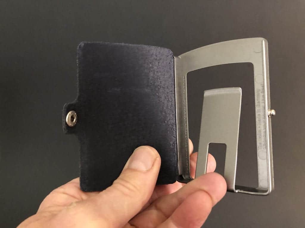 I-clip wallet open showing frame and leather cover.