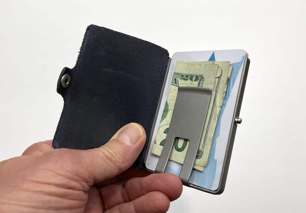 I Clip open showing cash under money clip
