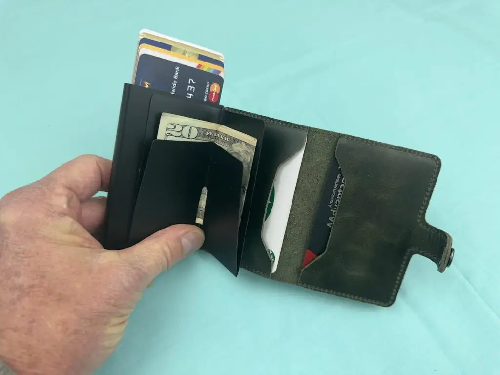 Secrid Miniwallet open with cards and cash