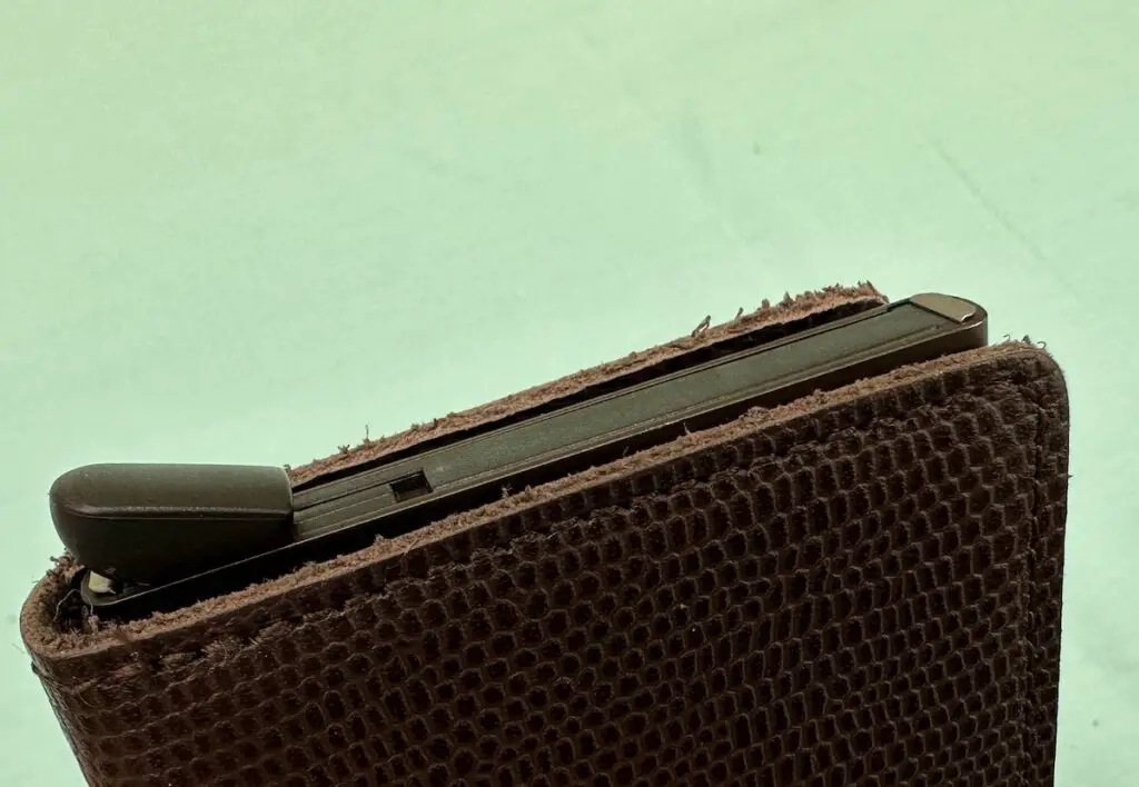 Secrid Slimwallet showing stray fibers on edge of leather